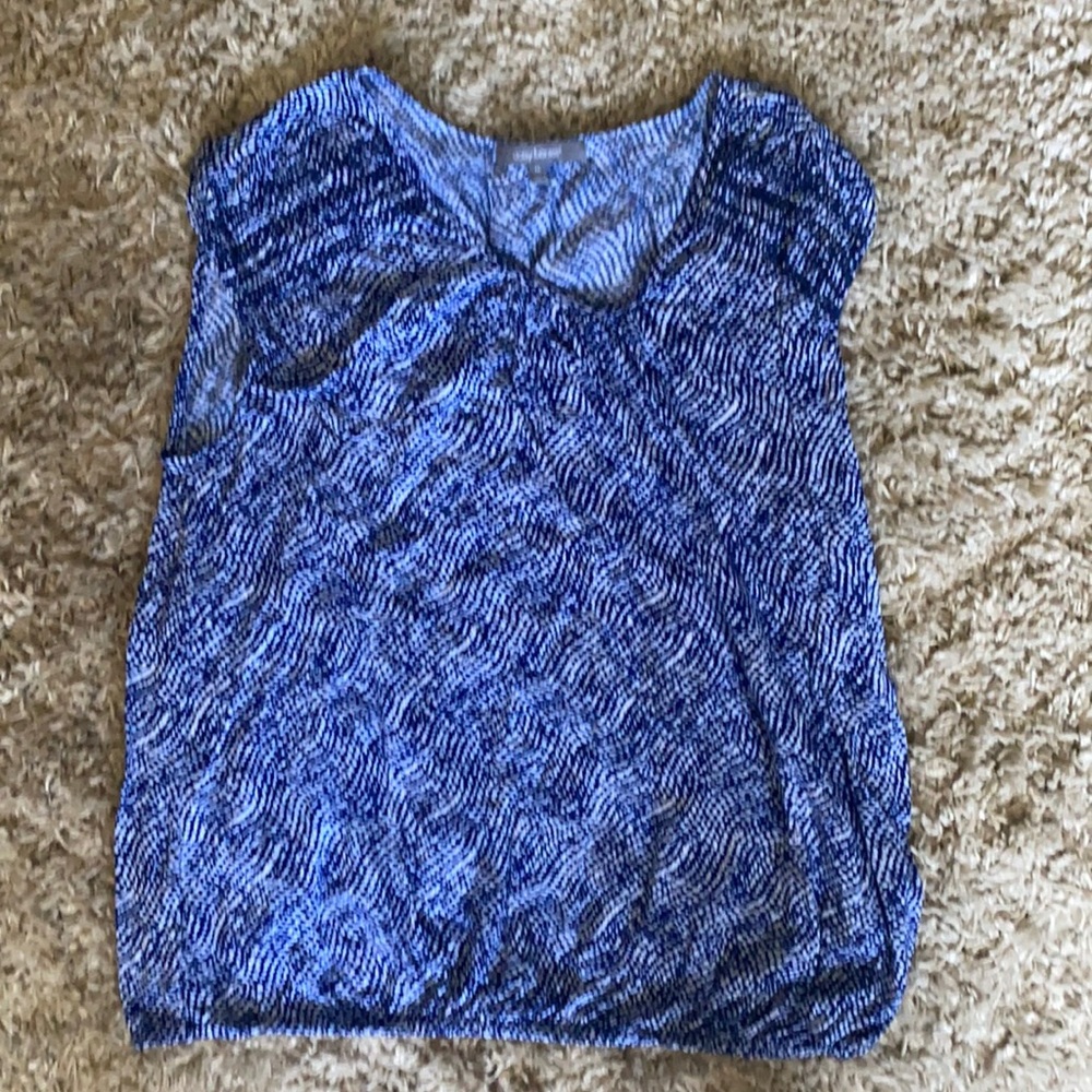 Daisy Fuentes sleeveless top.
